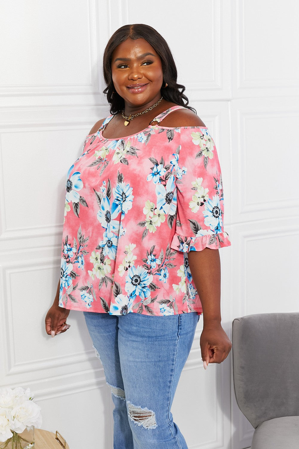 Close up view of the cutout shoulder detailing on the Sew In Love Full Size Fresh Take Floral Cold-Shoulder Top