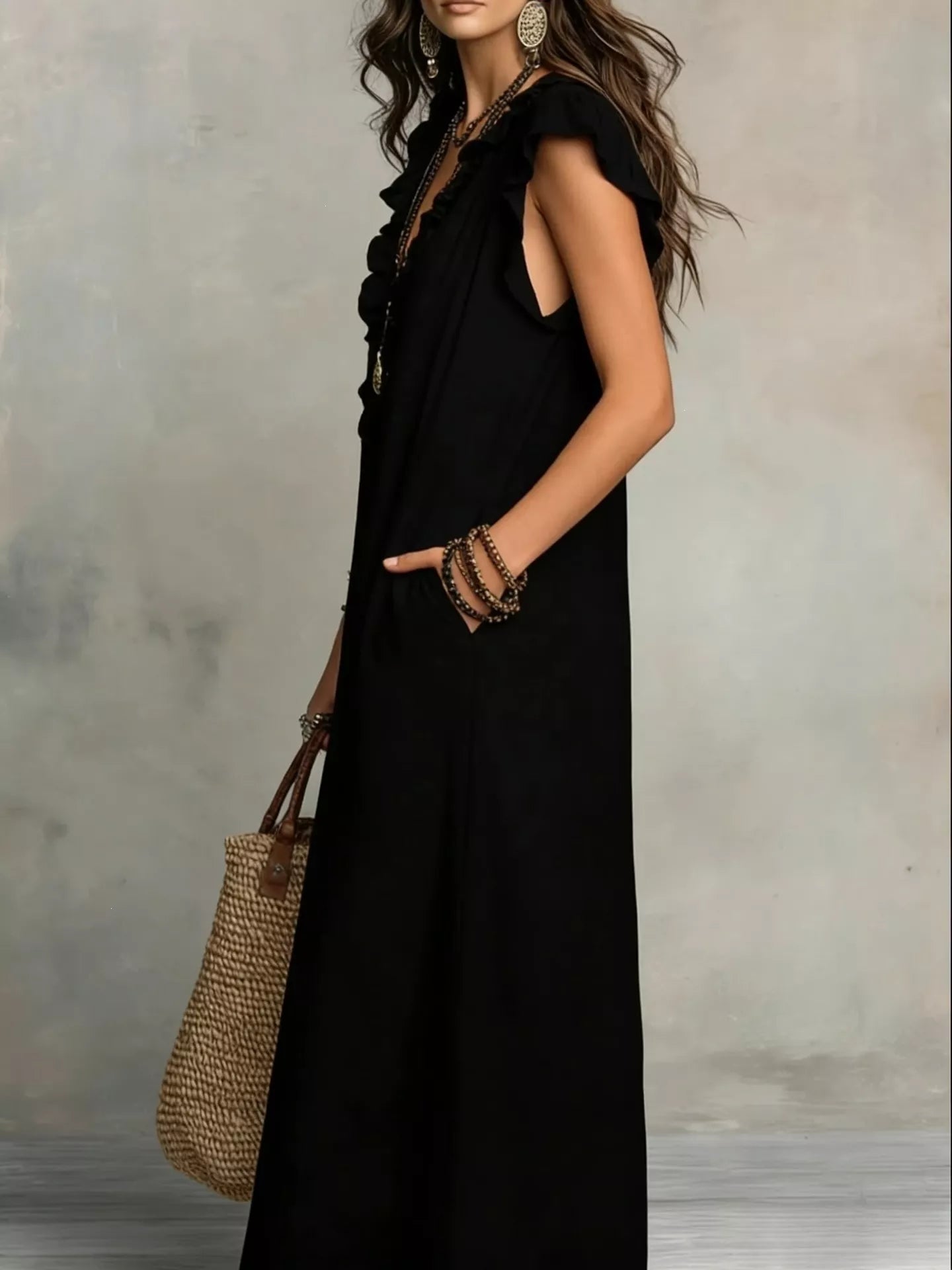 Close up of the ruffle detailing on a full size ruffled v-neck cap sleeve maxi dress plus size