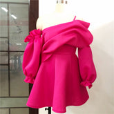 : Sexy one shoulder mini party dress with a pleated skirt, a single puff sleeve, and a backless design.
