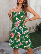 Close up view of the adjustable shoulder strap sliders on a Plus Size Printed V-Neck Cami Dress