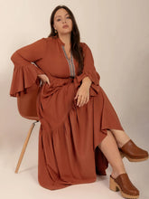  Plus size notched midi dress featuring elegant ruffles and sophisticated long sleeves.Do