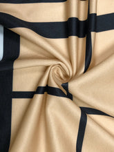 Close up look at the adjustable waist side ties on a Plus Size Plaid V-Neck Long Sleeve Wrap Dress