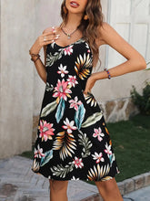 Close up view of the adjustable shoulder strap sliders on a Plus Size Printed V-Neck Cami Dress