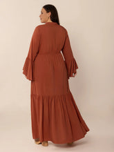  Plus size notched midi dress featuring elegant ruffles and sophisticated long sleeves.Do