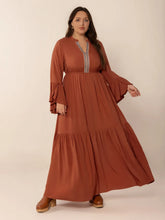  Plus size notched midi dress featuring elegant ruffles and sophisticated long sleeves.Do