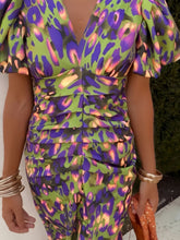 Detailed close up view of the elastic cuffs on a Full Size V-Neck Puff Sleeve Midi Dress Plus Size