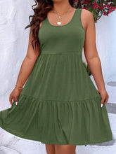  Plus size scoop neck tank dress featuring a flowing tiered skirt design.