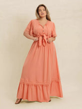  Plus size lace top and skirt set featuring intricate lace paneling and a chic tie neck.