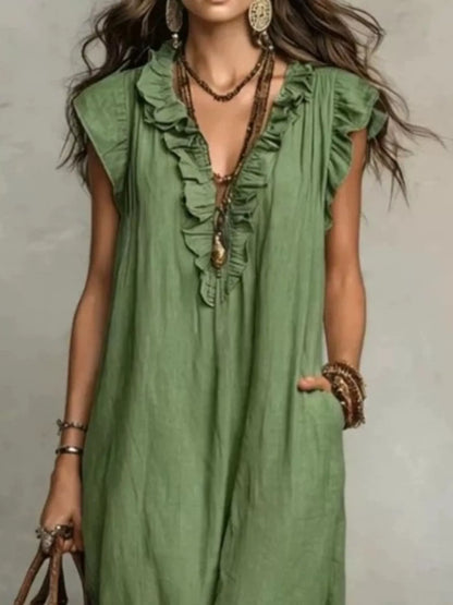 Close up of the ruffle detailing on a full size ruffled v-neck cap sleeve maxi dress plus size