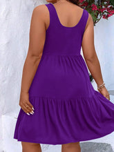  Plus size scoop neck tank dress featuring a flowing tiered skirt design.