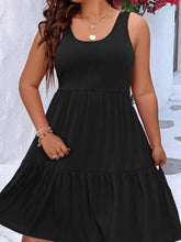  Plus size scoop neck tank dress featuring a flowing tiered skirt design.