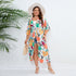 Rear view details of the lightweight fabric on the plus size casual vacation sun protection clothing bohemian loose printed beach shawl