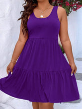  Plus size scoop neck tank dress featuring a flowing tiered skirt design.