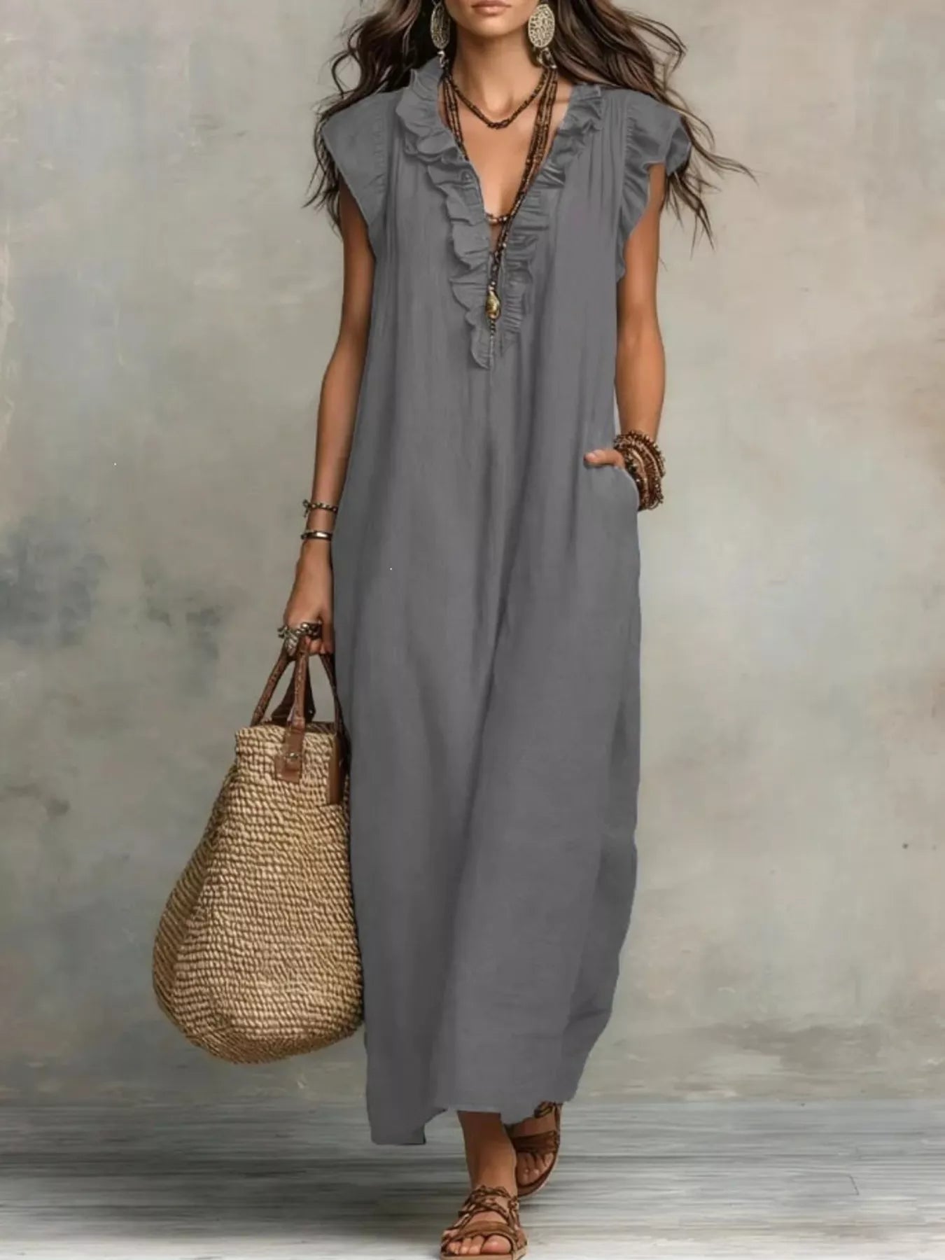 Close up of the ruffle detailing on a full size ruffled v-neck cap sleeve maxi dress plus size