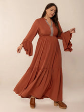  Plus size notched midi dress featuring elegant ruffles and sophisticated long sleeves.Do