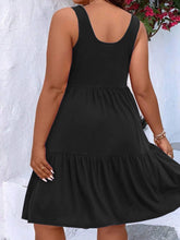  Plus size scoop neck tank dress featuring a flowing tiered skirt design.