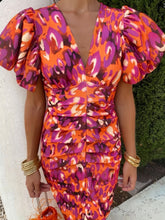 Detailed close up view of the elastic cuffs on a Full Size V-Neck Puff Sleeve Midi Dress Plus Size