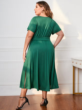  Honey plus size surplice neck midi dress with short sleeves and a flattering faux-wrap bodice.