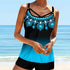 Woman wearing a classic black skirted one-piece swimsuit by the pool