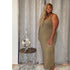 Model wearing a tropical leaf print women’s plus size sundress with a V-neckline